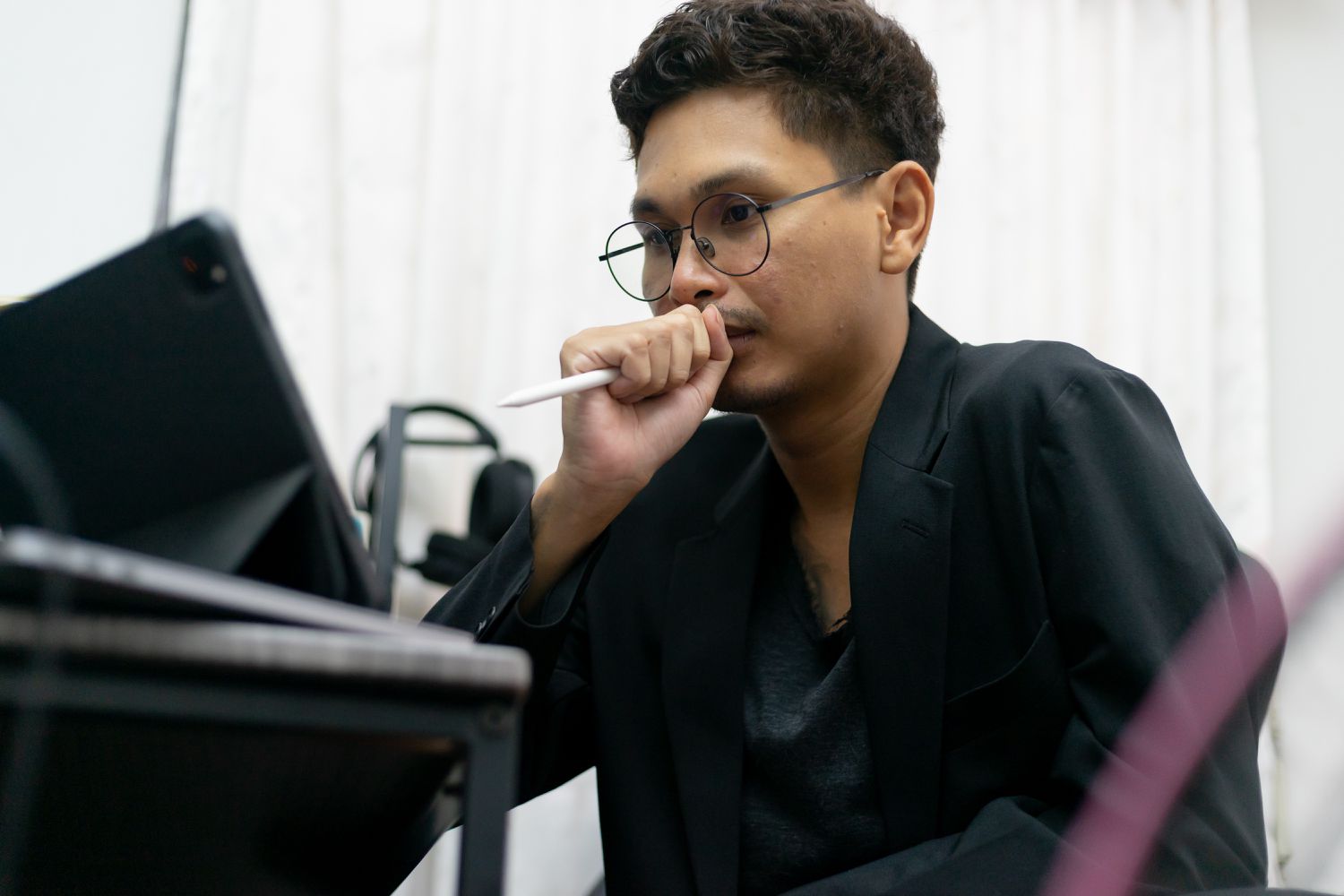 Stock market swing trader studying stock charts on their computer.