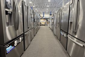 An aisle between rows of new refrigerators at a Best Buy in California in March. 