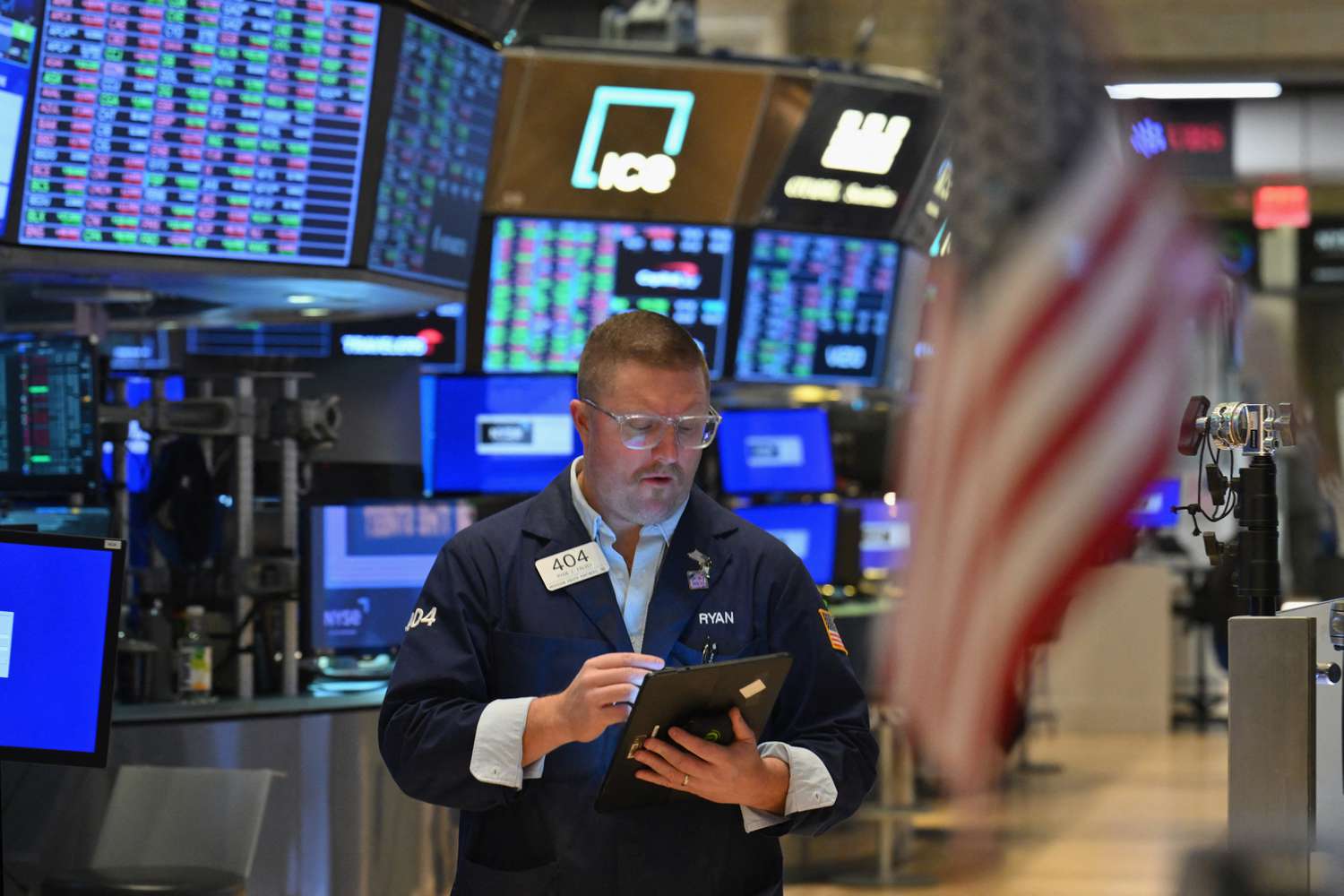 A trader works on the floor of the New York Stock Exchange.