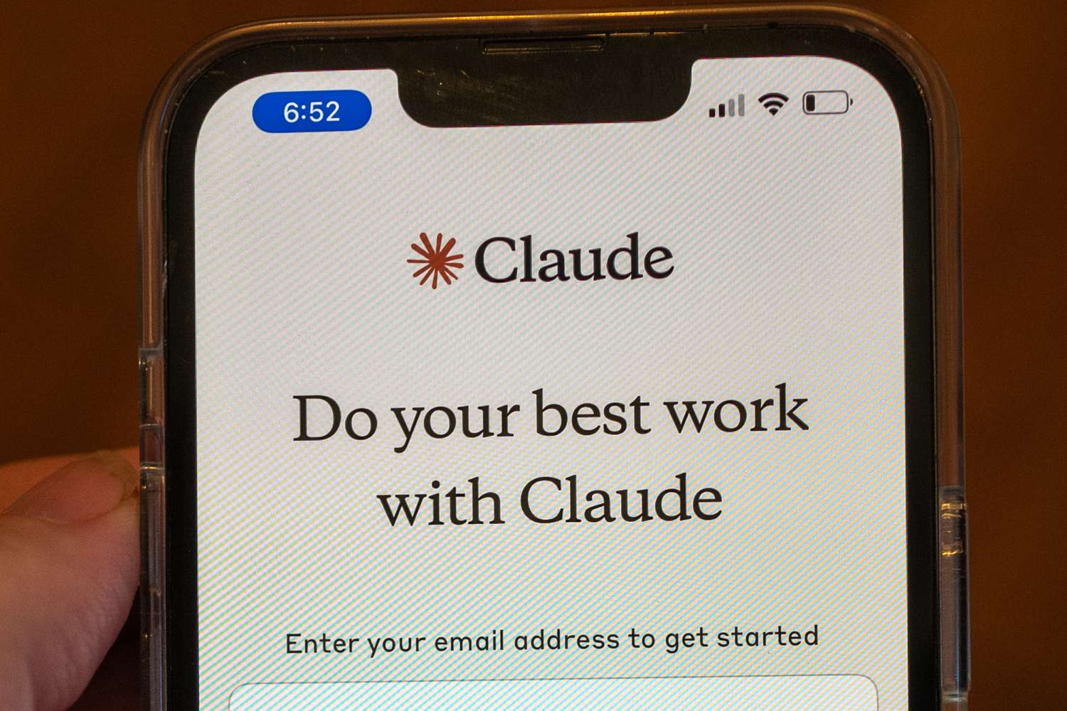 Phone screen displaying Anthropic Claude app.