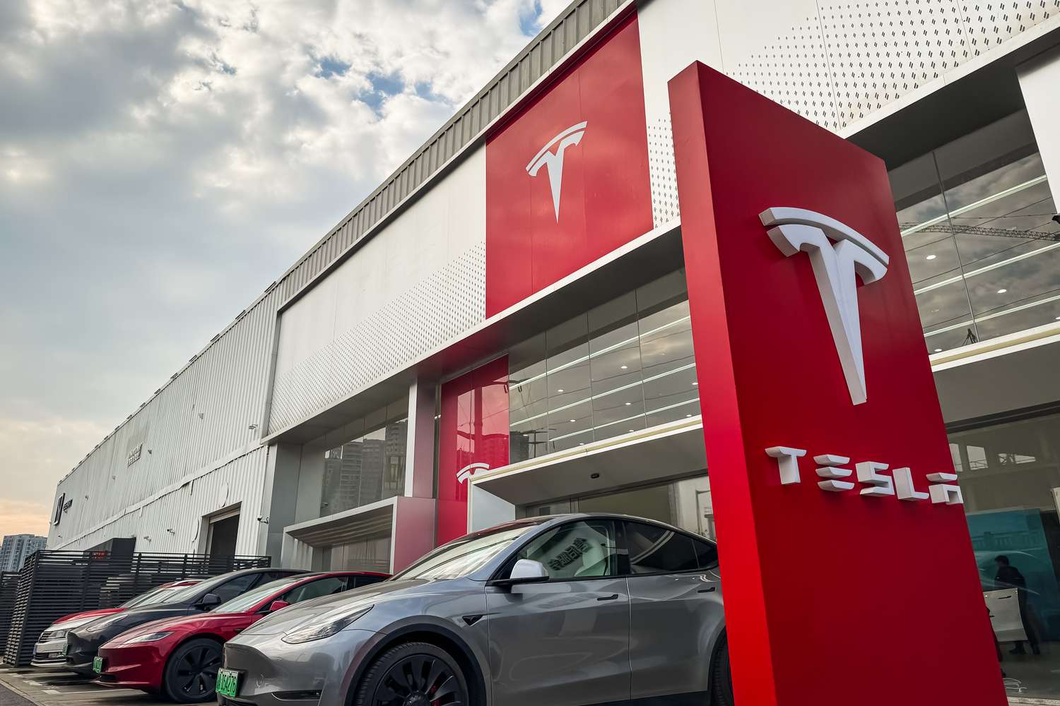 A Tesla showroom with its logo and electric vehicles on display, including the Model 3 and Model Y, is seen on January 12, 2025, in Chongqing, China.