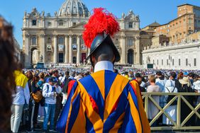 Papal Swiss Guard in uniform at Saint Peter Square. 