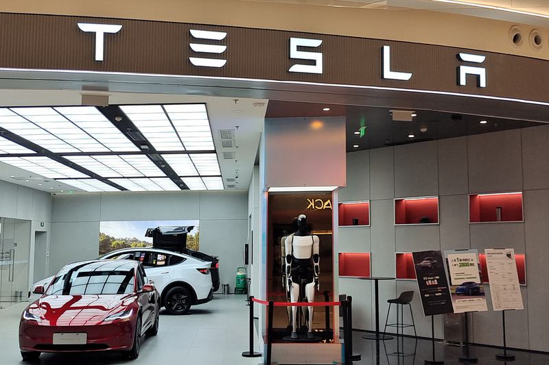 shares lost ground when China’s Xiaomi announced that its new electric SUV that looks to challenge Tesla's Model Y will be launched in China on Thursday