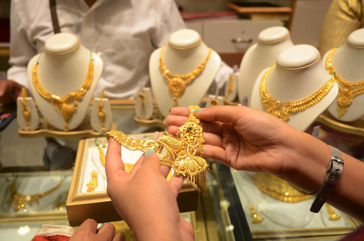 Customers buying gold jewelry