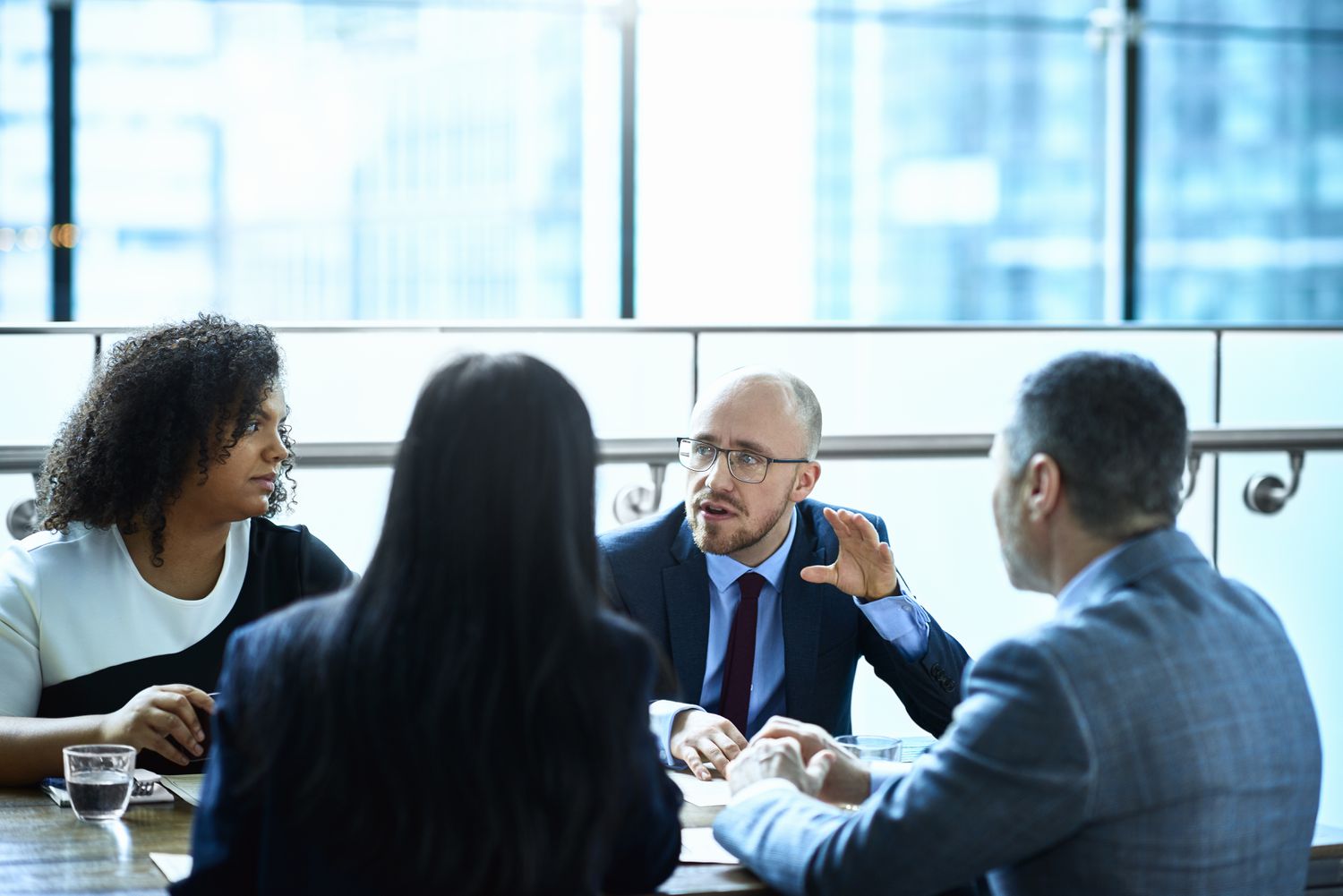 A brokerage house manager explains the soft dollar commission basis of a new fund they represent to a group of investment advisors.