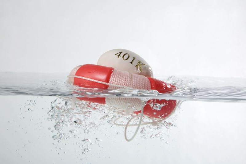 A 401k Egg held over water by a life ring