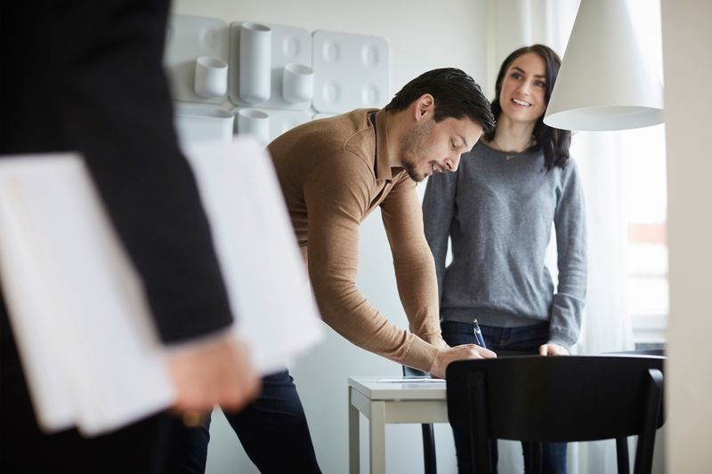Real estate professionals working on a real estate transaction