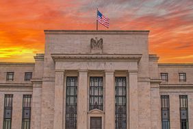 The Federal Reserve building at sunset