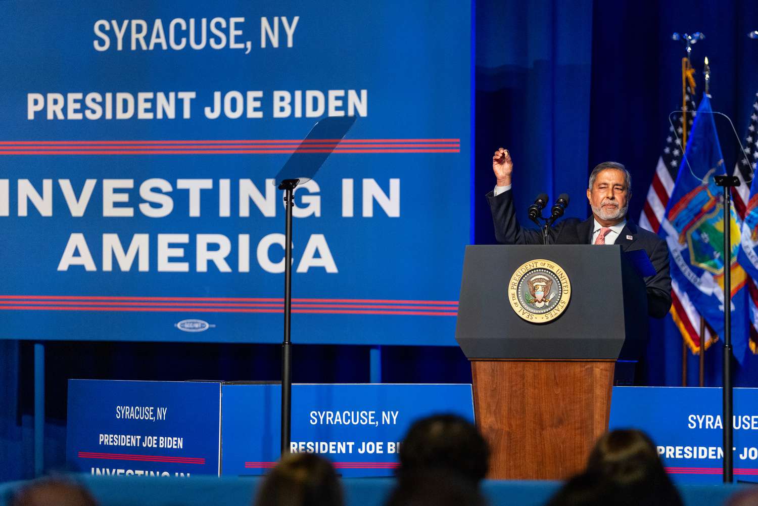 Sanjay Mehrotra, president and chief executive officer of Micron Technology Inc., holds up a microchip while speaking during an event with US President Joe Biden, not pictured, at the Milton J. Rubenstein Museum of Science and Technology in Syracuse, New York, US, on Thursday, April 25, 2024.
