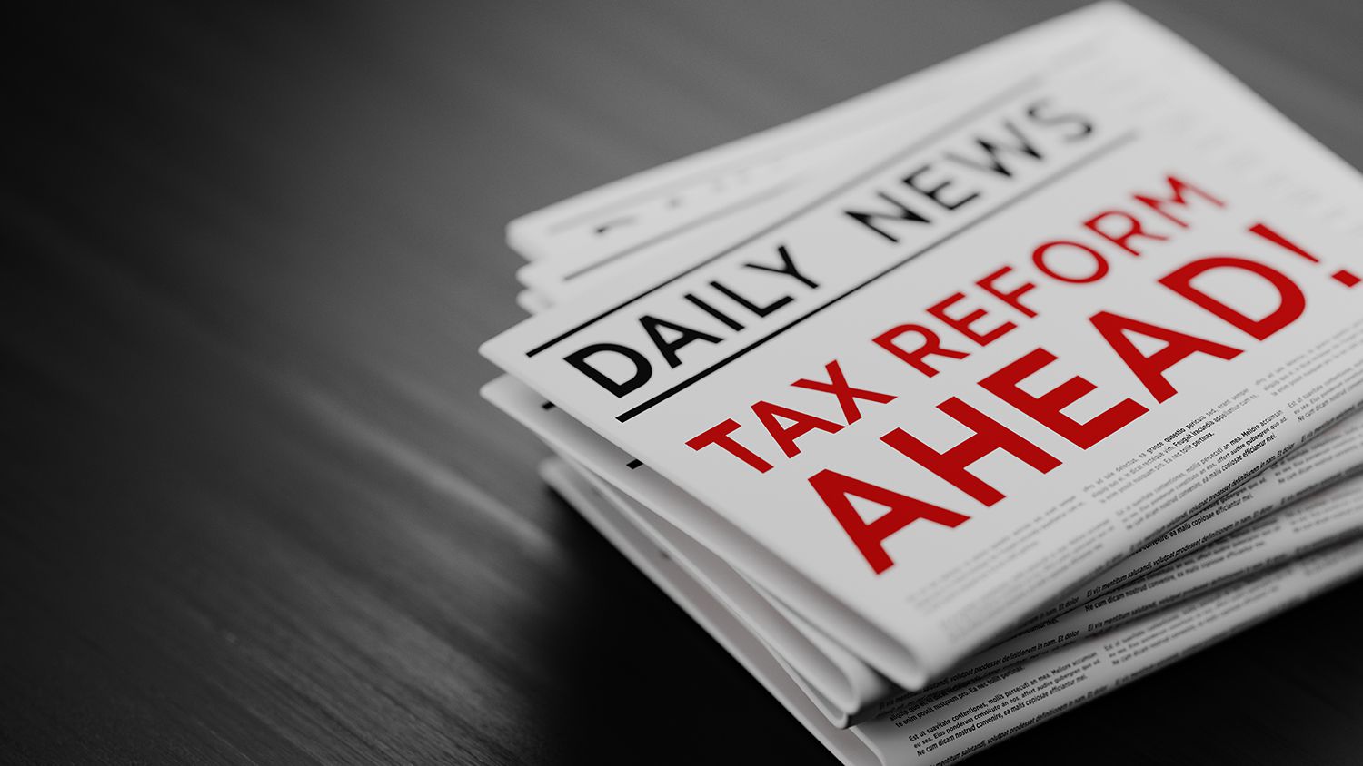 Tax Reform Concept Newspaper Pile On Black Wood Surface