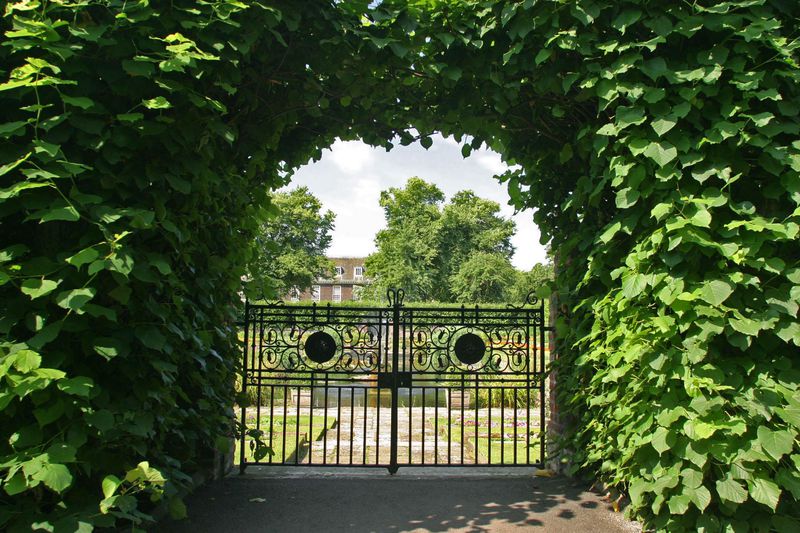 A gate to formal gardens.