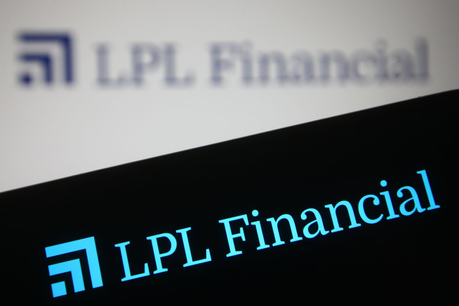 The LPL Financial logo is seen on a phone screen in front of a white background with the LPL loogo.