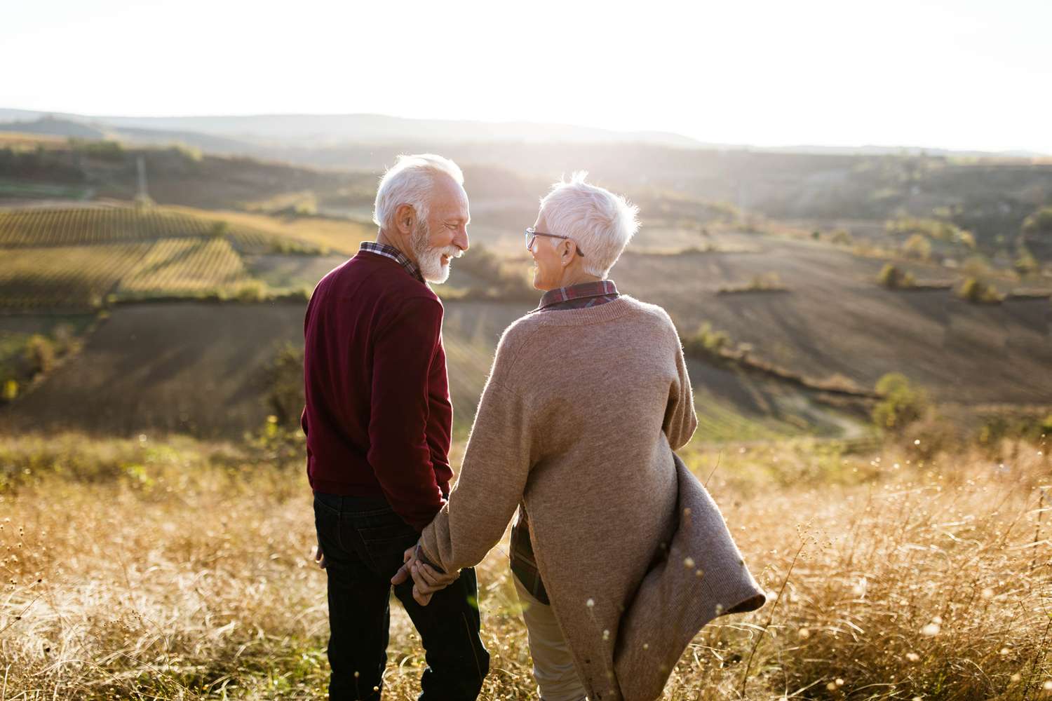 Couple walking on a hill