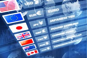 Currency exchange board showing exchange rates for U.S. dollar, the Euro, the Japanese Yen, and other currencies. 