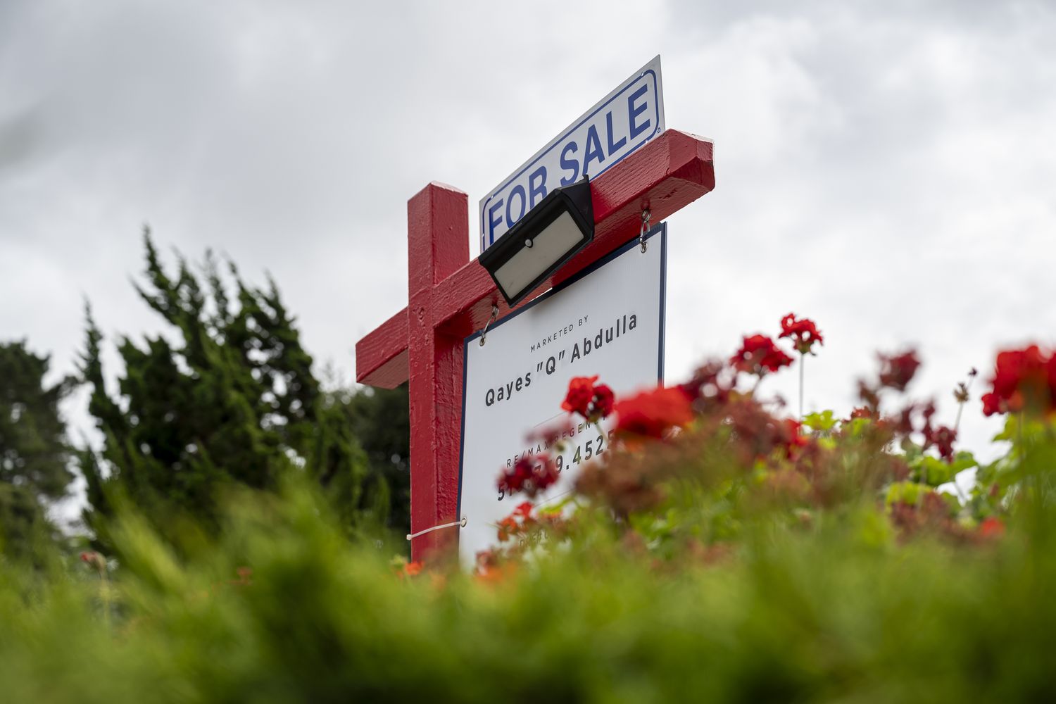 A "For Sale" sign at a residential home in Pinole, California, US, on Wednesday, Sept. 18, 2024.