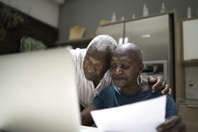 Senior couple doing home finances.