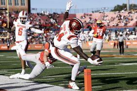 Tight End Harold Fanning Jr. #44 of Bowling Green from the National Team reach for the pylon before being forced out of bounds by Linebacker Jack Kiser #20 of Notre Dame from the American Team during the second half of 2025 Reese's Senior Bowl at Hancock Whitney Stadium on the campus of the University of South Alabama on February 1, 2025 in Mobile, Alabama.