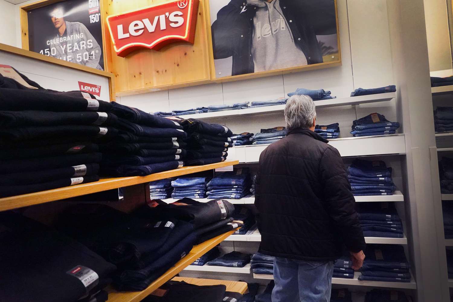 A customer shops for Levi's clothing at a department store on January 29, 2024 in Chicago, Illinois