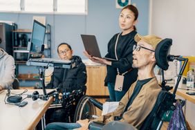 People with varying abilities working in an office