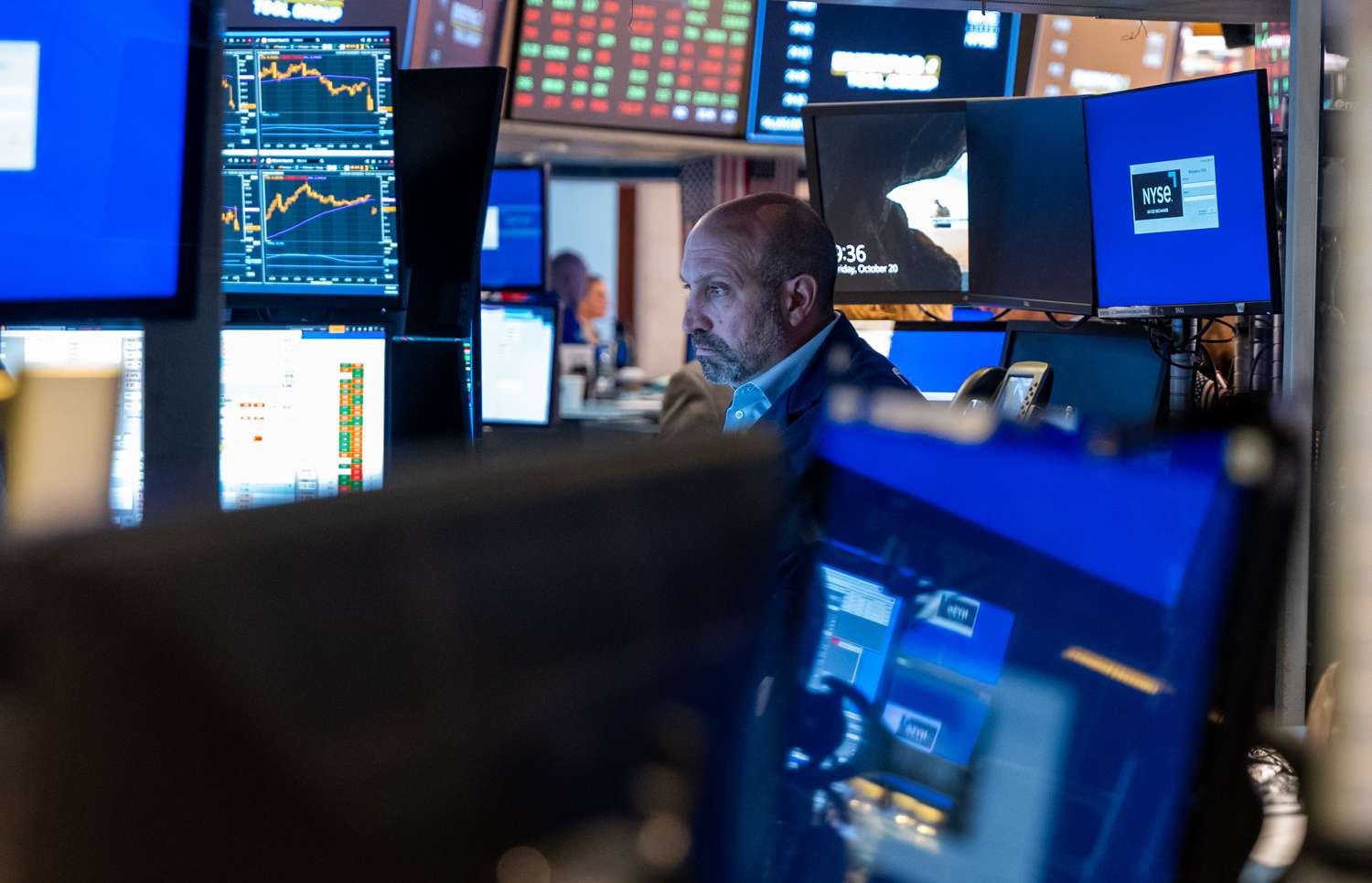 Traders work on the floor of the New York Stock Exchange.