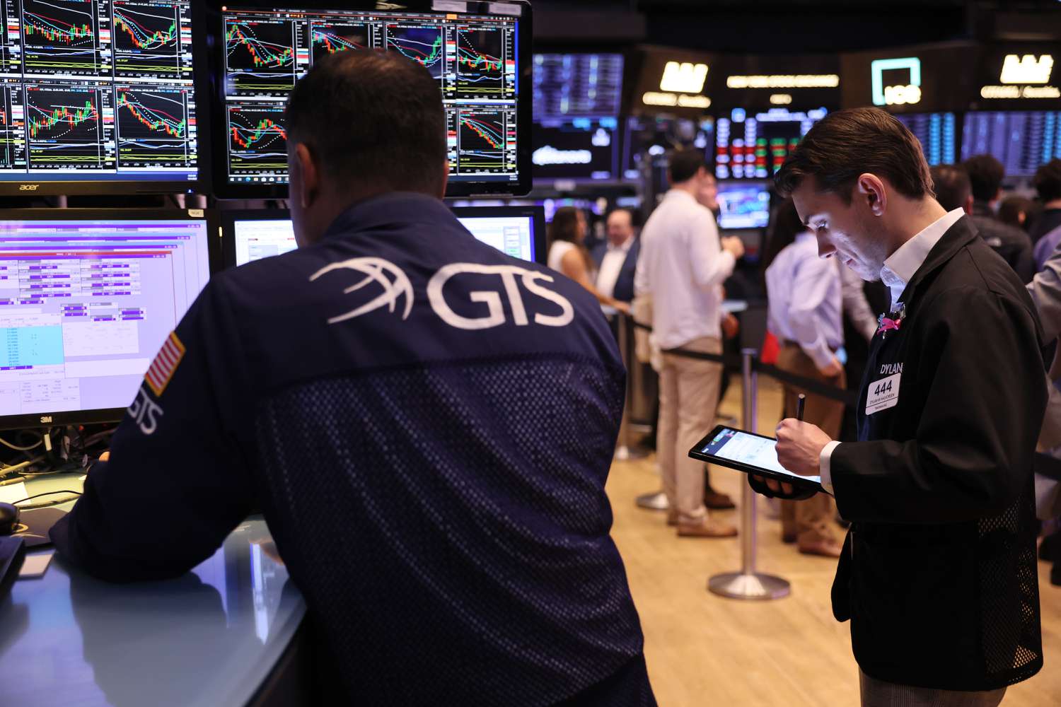 Traders work on the floor of the New York Stock Exchange.
