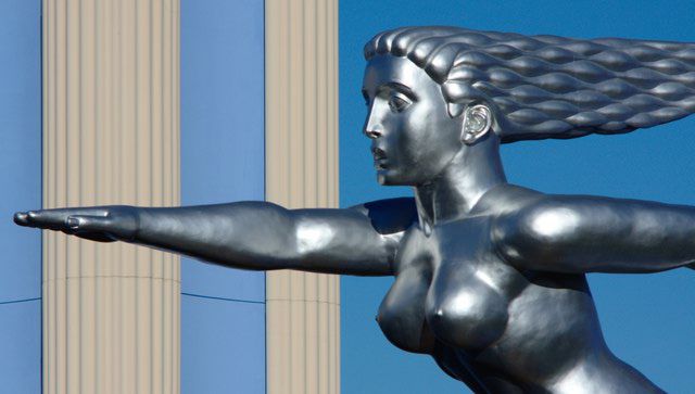 Massive art deco metal sculpture in Fair Park, Dallas, nude woman, hair flowing backwards