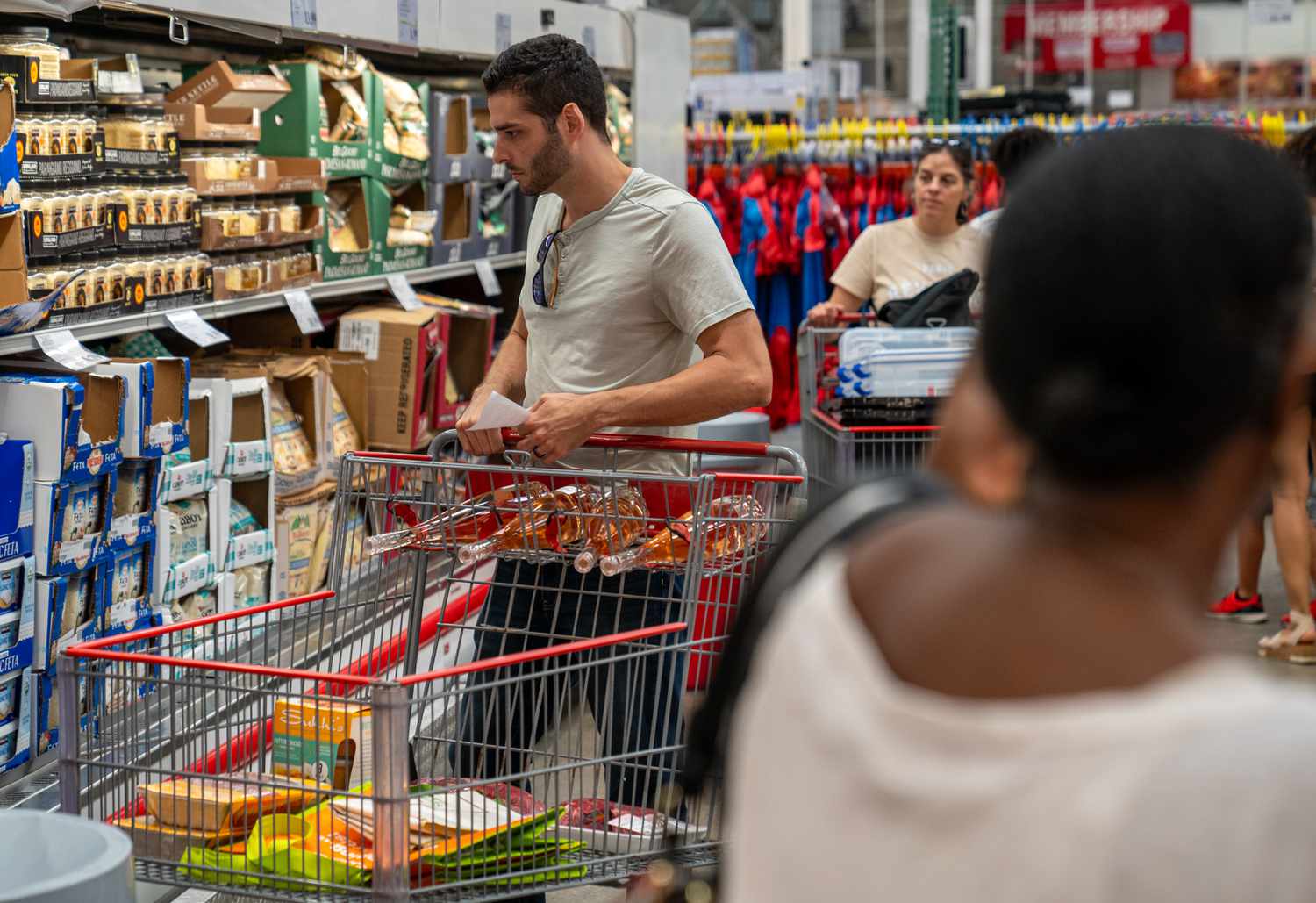 Shoppers at a Costco warehouse