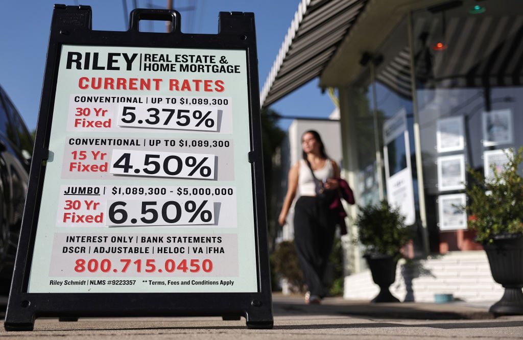 Home mortgage rates are posted outside a real estate office after the Federal Reserve interest rates announcement on September 18, 2024 in Los Angeles, California.