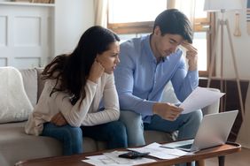 Couple looking at papers