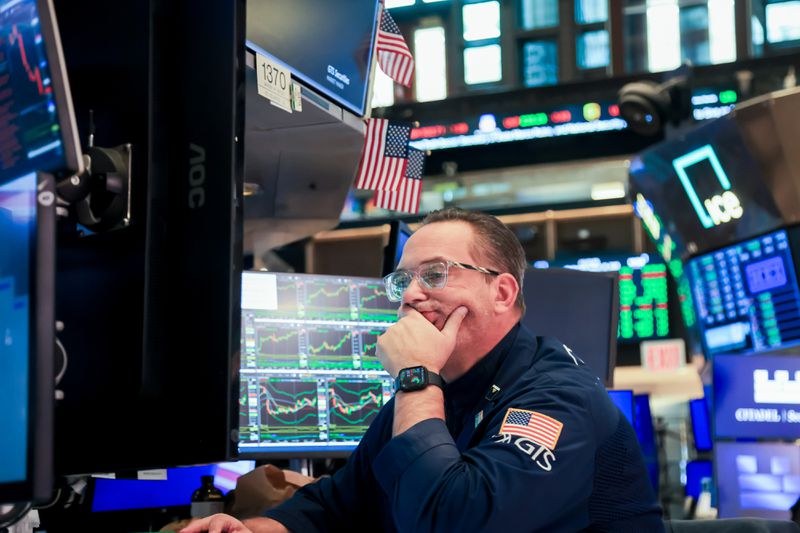 A trader works on the floor of the New York Stock Exchange.