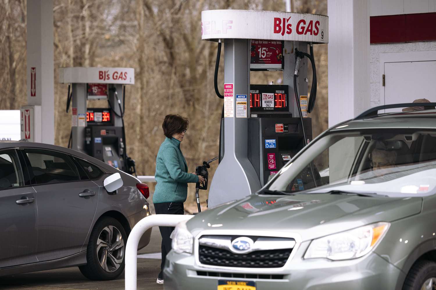 A customer at a BJ's gas station outside a BJ's Wholesale Club location in Albany, New York, US, on Monday, March 4, 2024. 