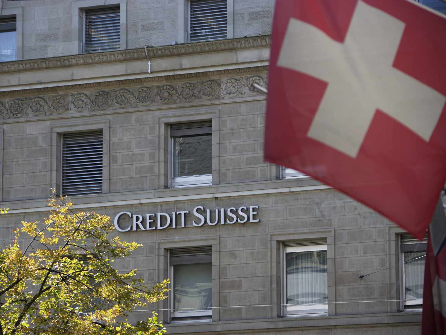 Facade of Swiss bank with Swiss flag, Bank Building of Credit Suisse, Bahnhofstrasse, Zurich, Canton of Zurich, Switzerland