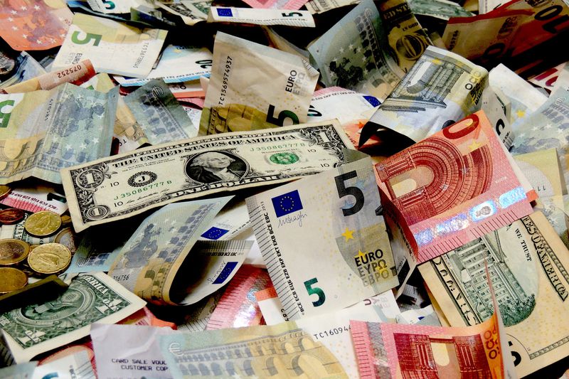 A pile of money from various countries