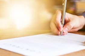 Business Man Signing Contract Document