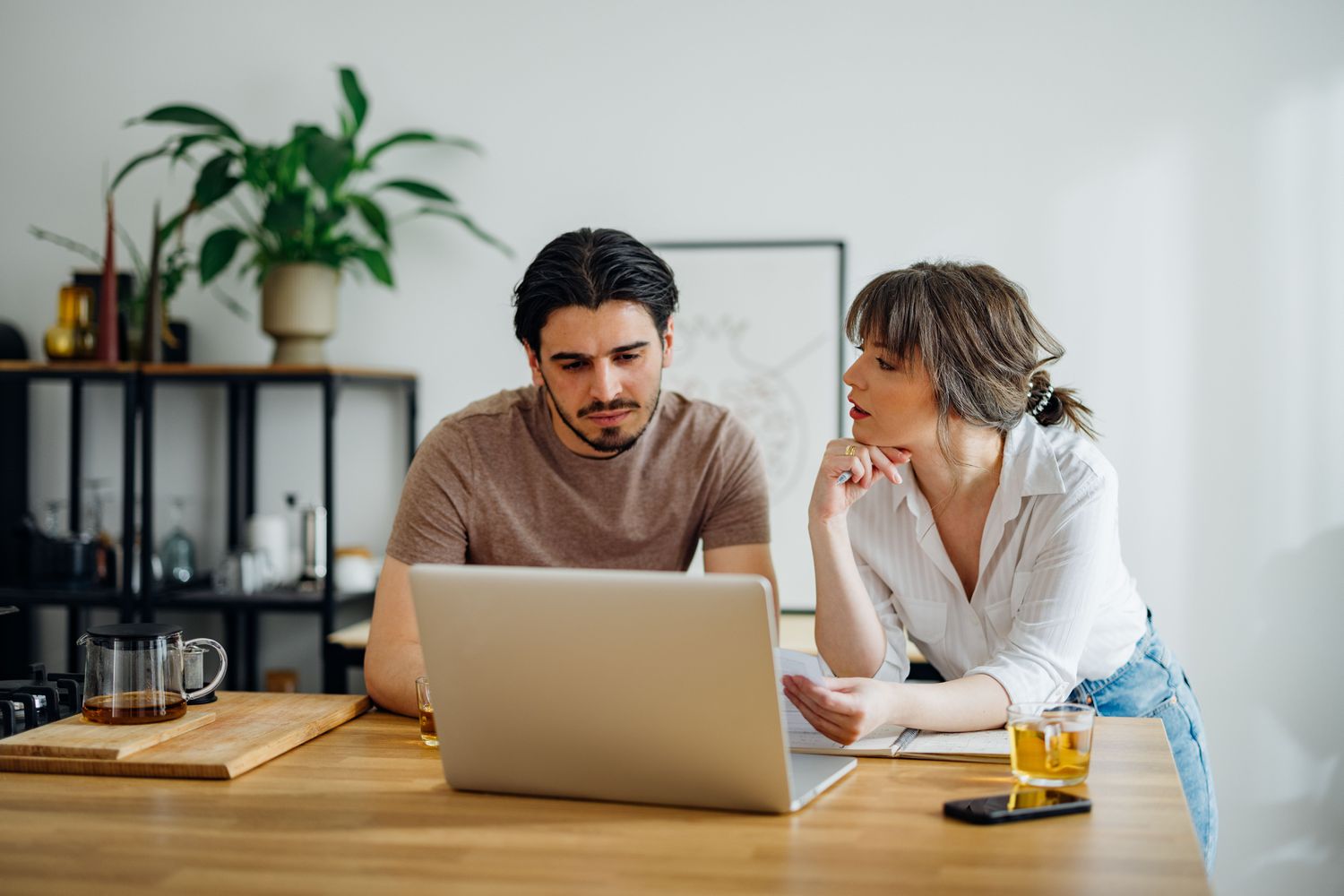 Couple in front of a computer