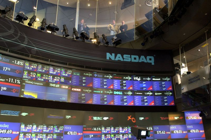 Shot of a board in the NASDAQ displaying tickers
