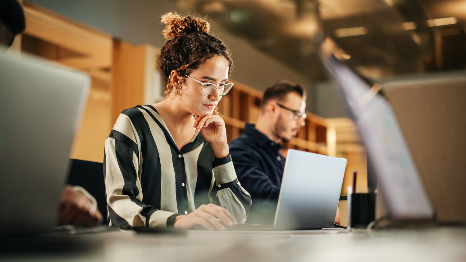 A woman working at a computer
