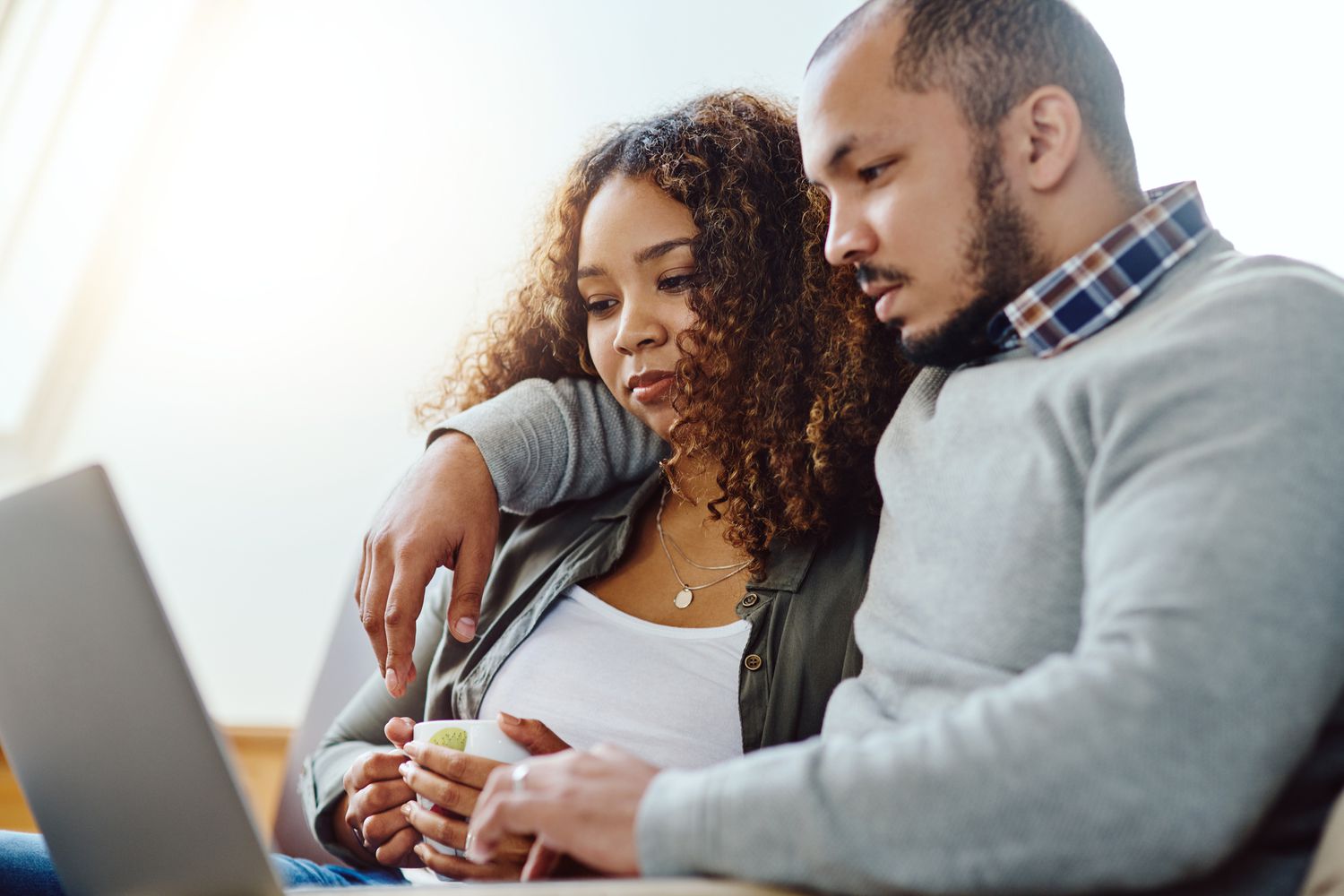 Couple looking at how much they could save with today's mortgage interest rates
