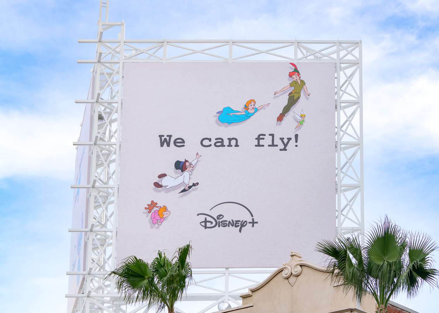 A billboard promoting Disney+.
