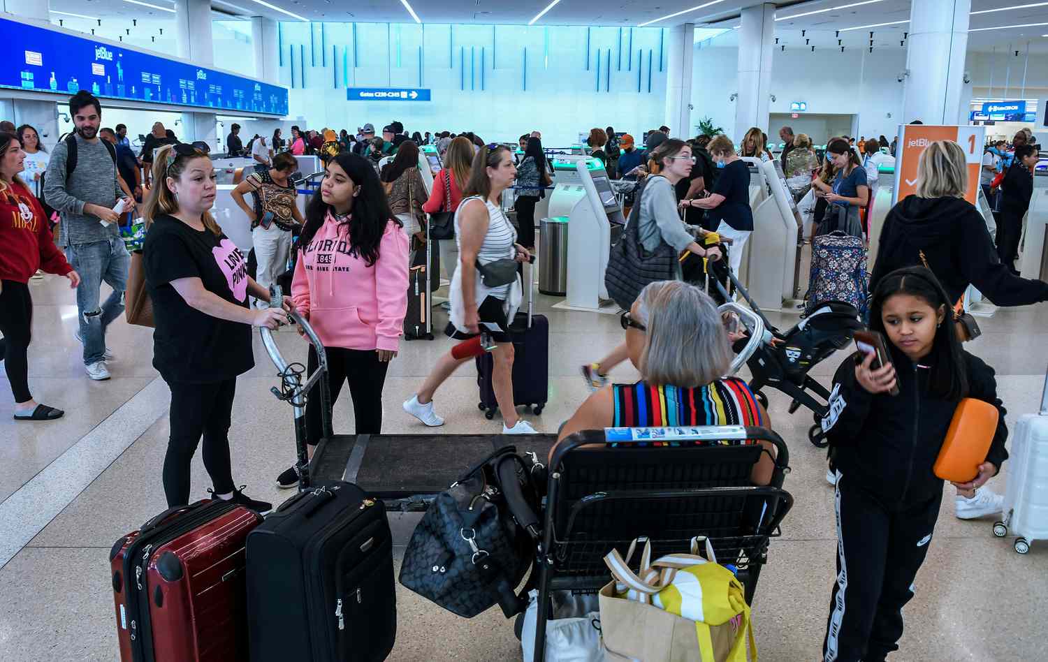 Travelers make their way through Orlando International Airport during the busy Labor Day holiday weekend in Orlando. According to the American Automobile Association, Orlando is a top five Labor Day travel destination. Orlando International Airport is expecting more than 900,000 passengers, a 14 percent increase over 2022.