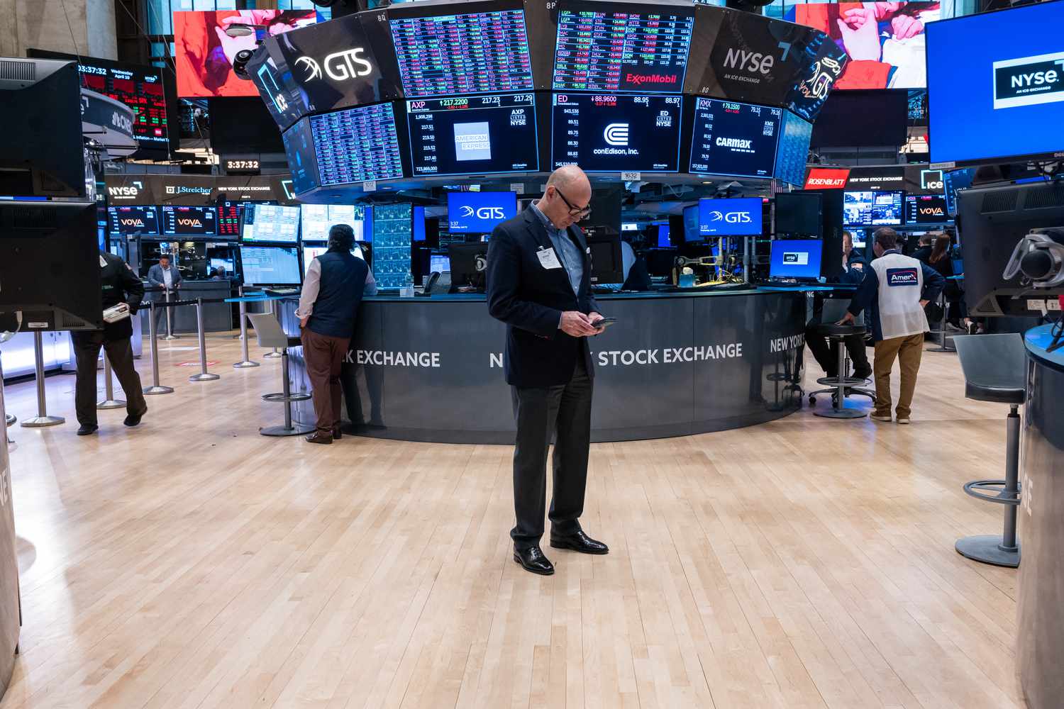 Traders work on the floor of the New York Stock Exchange.