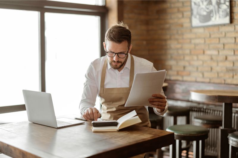 Business owner prepares documents to apply for a swingline loan.