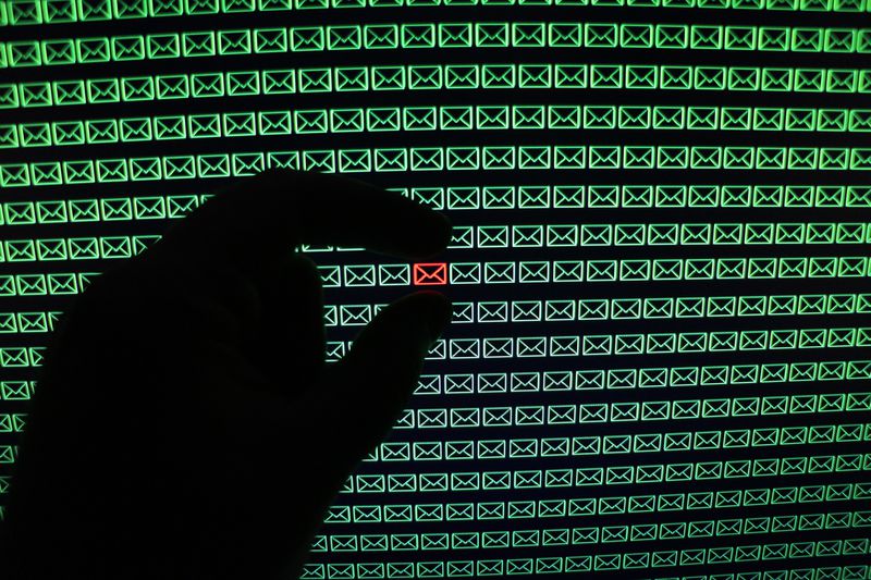 A hand plucking an envelope icon out of a pile