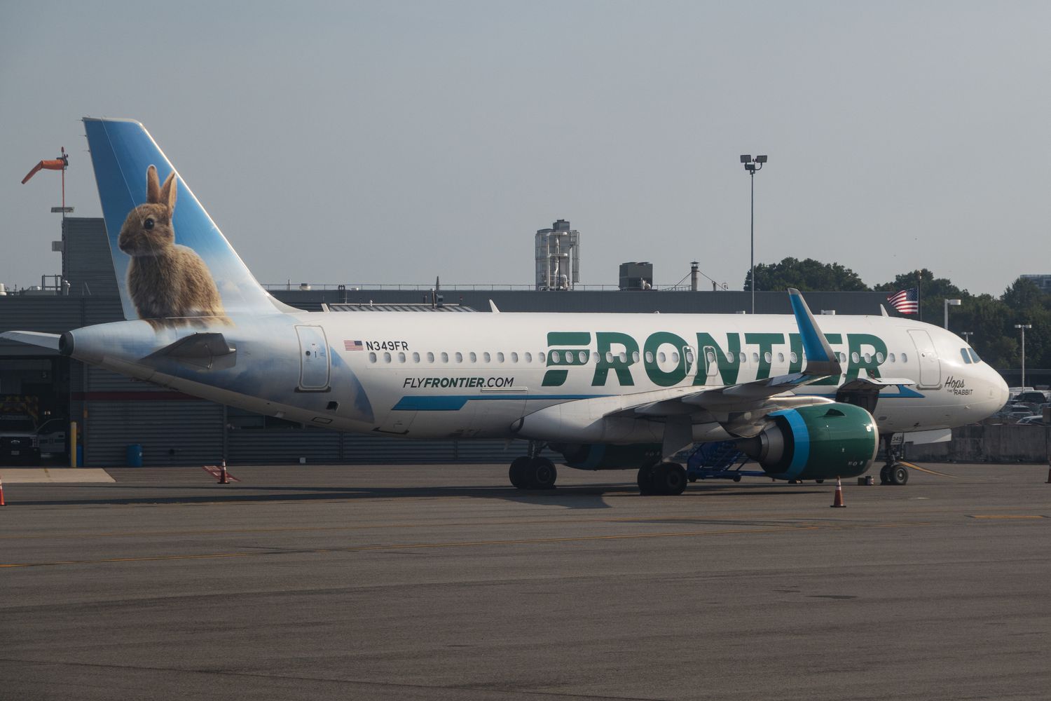 A Frontier Airlines Airbus A320 aircraft is parked at Ronald Reagan Washington National Airport on August 28, 2024 in Arlington, Virginia