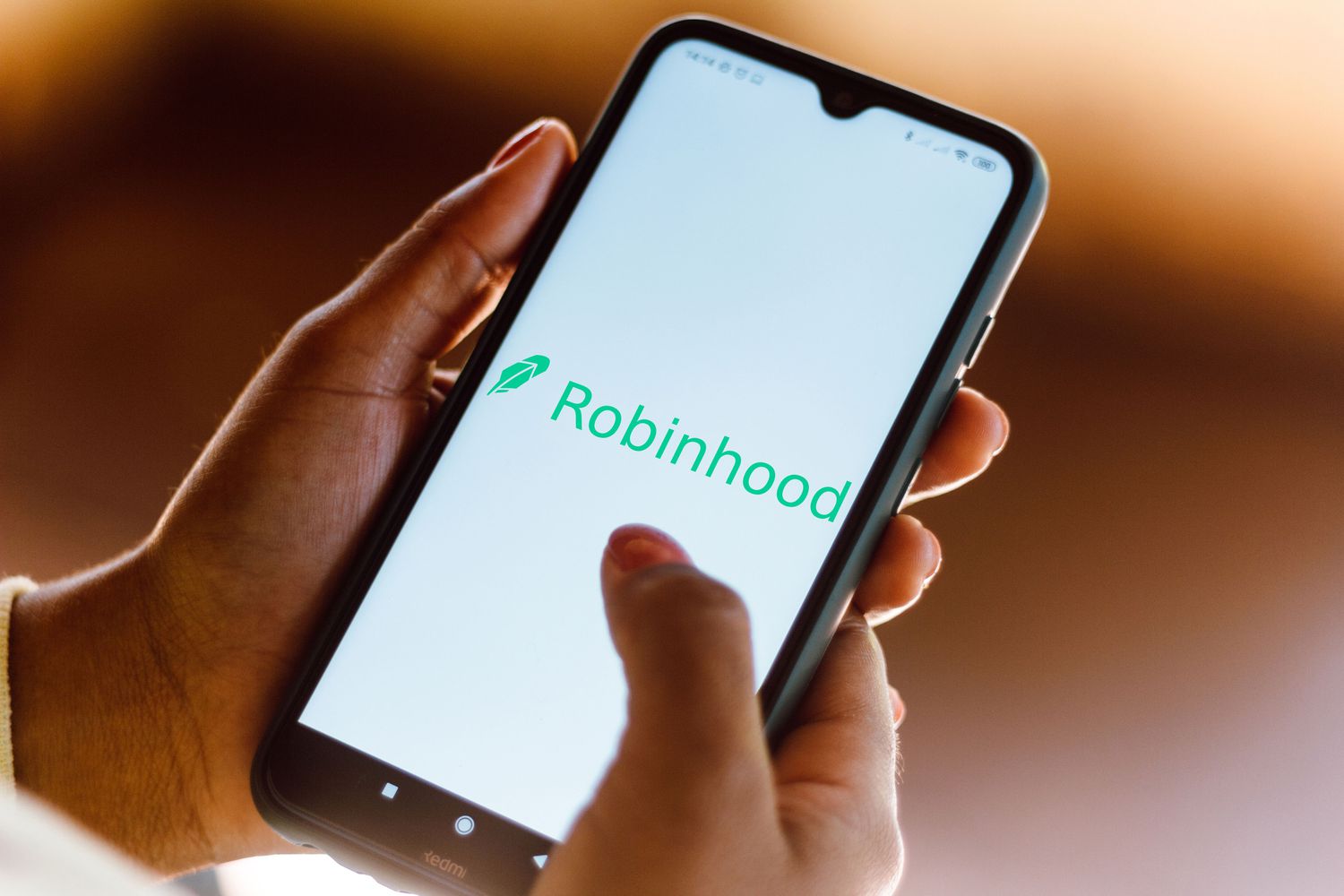 Person using Robinhood app on a smartphone