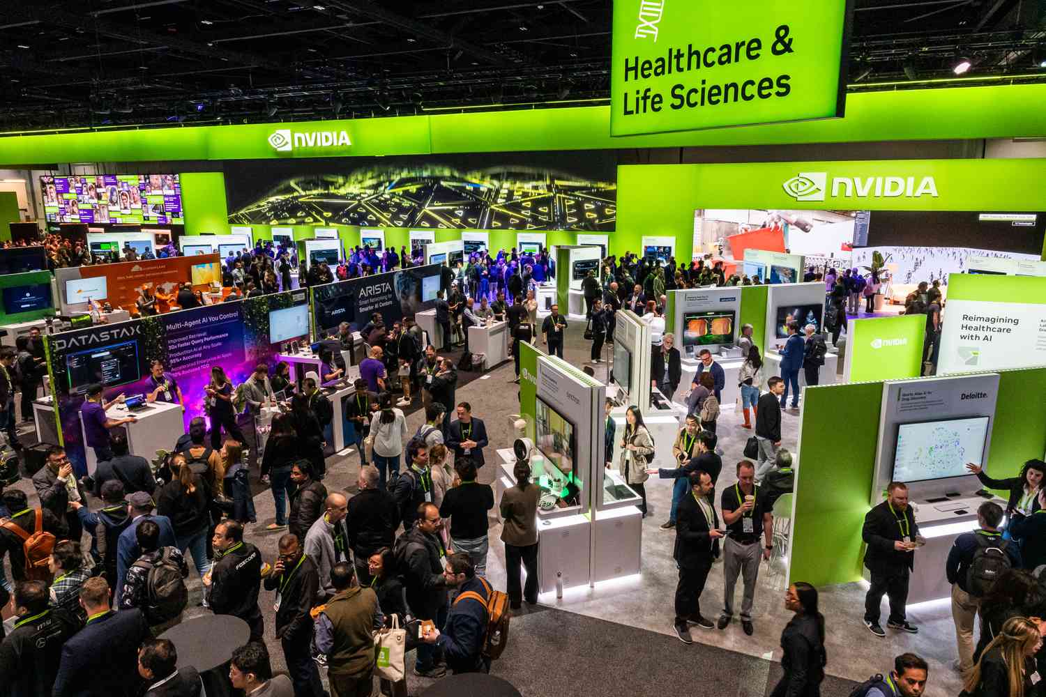 Attendees on the exhibition floor during Nvidia's GTC in San Jose, California on March 20, 2025