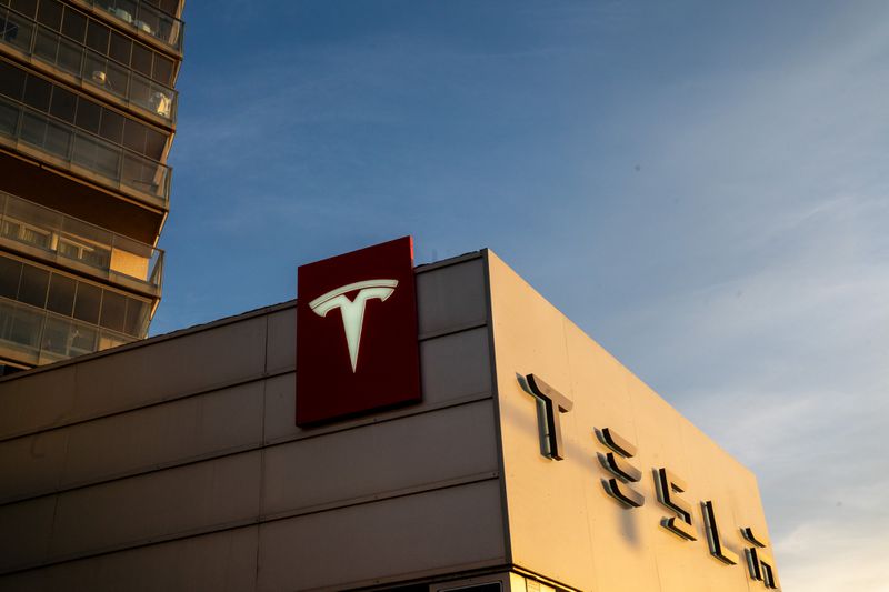 Tesla logo and sign