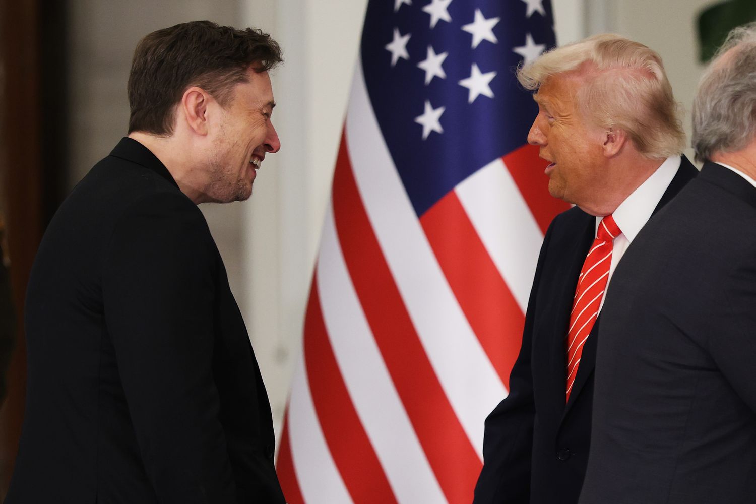 U.S. President Donald J. Trump greets Tesla CEO Elon Musk before a state dinner at the Lusail Palace on May 14, 2025, in Doha, Qatar. 