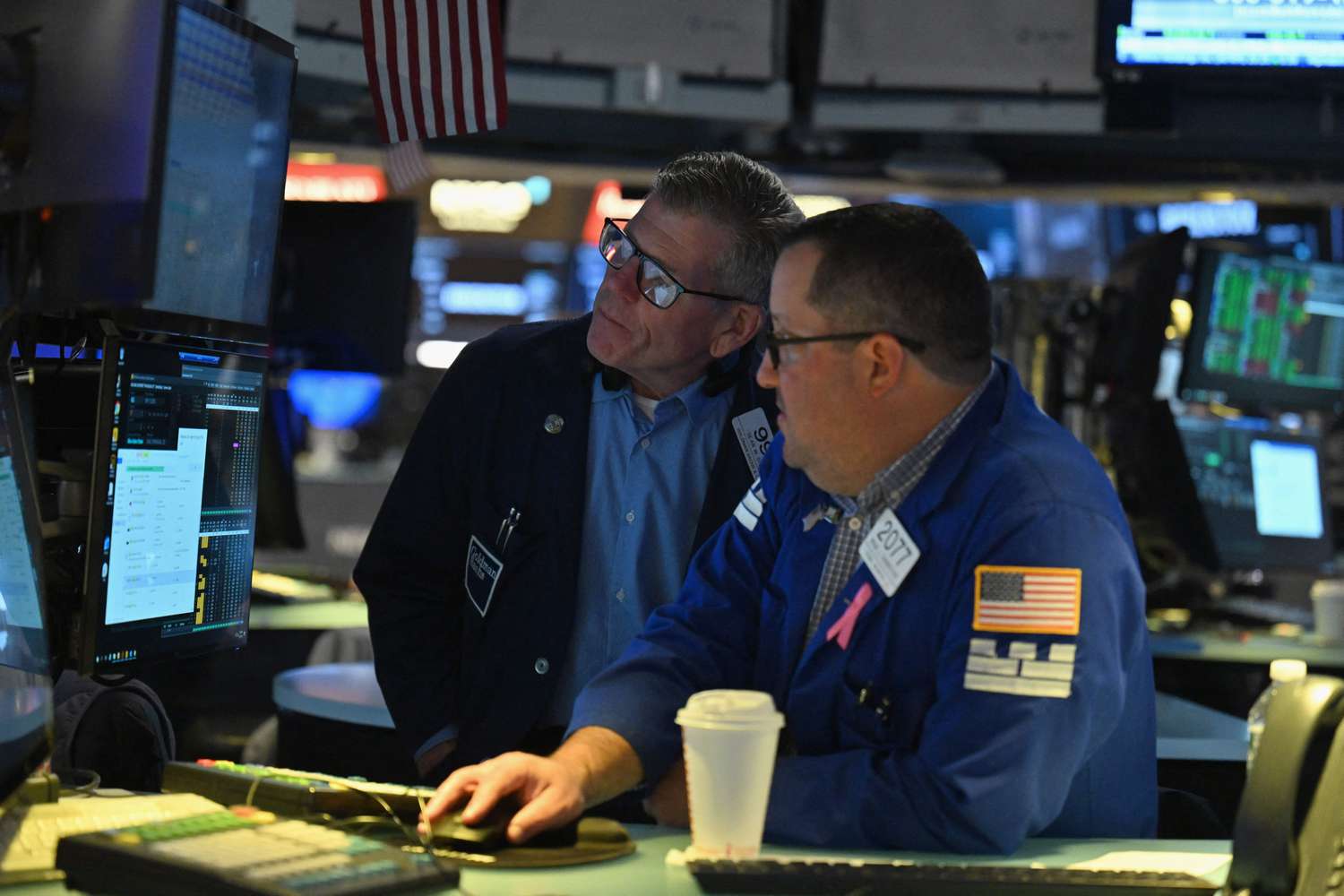Traders works the floors at the New York Stock Exchange (NYSE).