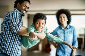 Family playing together at home